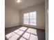 Sun-filled bedroom with plush carpet and a large window, creating a cozy and inviting space at 1480 Baygreen Rd, Suwanee, GA 30024