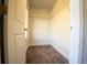 Walk-in closet features carpet and wire shelving for storage at 1480 Baygreen Rd, Suwanee, GA 30024