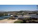 A wide angle shot of the neighborhood featuring tennis courts, a parking lot, and residential buildings at 1480 Baygreen Rd, Suwanee, GA 30024