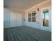 Covered outdoor deck featuring a neutral tone, and offering a peaceful space for relaxation or entertainment at 1480 Baygreen Rd, Suwanee, GA 30024