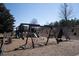 Image displays a playground set on a mulch surface featuring swings, slides, and climbing structures at 1480 Baygreen Rd, Suwanee, GA 30024
