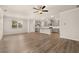 Open-concept living room and kitchen with hardwood floors, creating a seamless and inviting space at 1094 Georgian Point Dr Rd, Lawrenceville, GA 30045