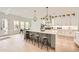 Spacious kitchen with a large center island, quartz countertops, stainless steel appliances, and custom cabinets at 1523 Grayson Pkwy, Grayson, GA 30017