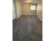 Neutral paint and carpet in this basement area at 4100 Seneca Way, Stone Mountain, GA 30083