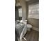 Bathroom with vanity, toilet, and mirror at 4100 Seneca Way, Stone Mountain, GA 30083