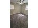 Inviting bedroom featuring plush carpeting, a ceiling fan, and windows that allow ample natural light at 4100 Seneca Way, Stone Mountain, GA 30083