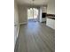 Open-plan dining area boasts sliding glass doors to the deck, seamlessly connecting indoor and outdoor living spaces at 4100 Seneca Way, Stone Mountain, GA 30083