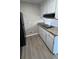 Well-lit kitchen featuring granite countertops and black appliances at 4100 Seneca Way, Stone Mountain, GA 30083