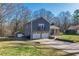 A lovely two-story home with a two-car garage and manicured front lawn at 2421 Pittman Cir, Cumming, GA 30040