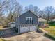 Charming home with an attached two-car garage and a balcony above it at 2421 Pittman Cir, Cumming, GA 30040