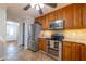 Kitchen with stainless steel appliances, granite countertops, and plenty of cabinet space at 2421 Pittman Cir, Cumming, GA 30040