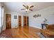 Inviting living room with hardwood floors and abundant closet space at 2421 Pittman Cir, Cumming, GA 30040