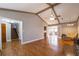 Spacious living room featuring vaulted ceilings, hardwood floors and a stone fireplace at 2421 Pittman Cir, Cumming, GA 30040