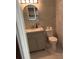 Modern bathroom features updated vanity, toilet, and marble flooring at 471 Tipton Dr, Riverdale, GA 30274