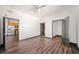 Bedroom with wood-style floors, ceiling fan and a closet at 5300 Peachtree Rd # 3507, Chamblee, GA 30341