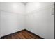 A bright closet features hardwood floors, neutral walls and wire shelving at 5300 Peachtree Rd # 3507, Chamblee, GA 30341