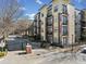 Apartment building behind gate with trees on a sunny day at 5300 Peachtree Rd # 3507, Chamblee, GA 30341