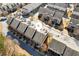 Aerial view of complex showcases well-maintained roofs, landscaping, and street access at 7420 Glisten Ave, Sandy Springs, GA 30328