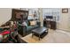 Enjoy this flex space with comfortable furniture, home office, and home exercise equipment at 7420 Glisten Ave, Sandy Springs, GA 30328