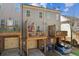 Rear of townhouses with private decks, drive under garages, and nicely landscaped surroundings at 7420 Glisten Ave, Sandy Springs, GA 30328