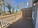 Wood deck with railing and a view of trees and a street at 5455 Blossomwood Sw Trl, Mableton, GA 30126