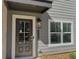 A close up of the front door and the house number of the home at 5455 Blossomwood Sw Trl, Mableton, GA 30126