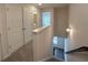 Upstairs hallway with carpet and view to the living room below at 5455 Blossomwood Sw Trl, Mableton, GA 30126