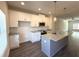 Bright kitchen with white cabinets, granite countertops, and stainless steel appliances at 5455 Blossomwood Sw Trl, Mableton, GA 30126