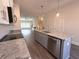 Modern kitchen island with granite countertops, stainless steel appliances at 5455 Blossomwood Sw Trl, Mableton, GA 30126