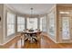 Charming dining area featuring a round table, stylish chairs, and natural light at 3743 Heathermoor Ct, Dacula, GA 30019