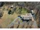 Expansive property featuring a well-maintained home, long driveway and large lawn at 8321 Banks Mill Rd, Douglasville, GA 30135