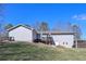 Spacious backyard featuring a wooden deck, perfect for outdoor entertaining, and ample green space at 8321 Banks Mill Rd, Douglasville, GA 30135