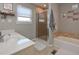 Bathroom featuring a shower, bath and sink vanity at 8321 Banks Mill Rd, Douglasville, GA 30135
