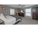 Spacious carpeted bedroom with closet and natural light at 8321 Banks Mill Rd, Douglasville, GA 30135