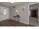 Inviting entryway featuring wood floors and contemporary decor at 8321 Banks Mill Rd, Douglasville, GA 30135