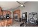 Bright eat-in kitchen featuring tile floors, stainless steel appliances, and wood cabinets at 8321 Banks Mill Rd, Douglasville, GA 30135