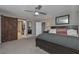 Main bedroom with sliding barn door leading to closet at 8321 Banks Mill Rd, Douglasville, GA 30135