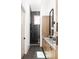 Modern bathroom featuring a glass-enclosed shower, sleek vanity, and stylish fixtures at 1290 Lupo Loop, Chattahoochee Hills, GA 30268