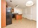 Spacious kitchen with island, wood cabinets and modern black appliances at 2838 Vining Ridge Ter # 0, Decatur, GA 30034
