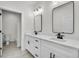 Modern bathroom featuring dual vanity sinks and stylish black fixtures at 474 Maxwell Rd, Roswell, GA 30075