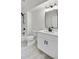 Modern bathroom with a sleek vanity, black hardware and walk in shower at 474 Maxwell Rd, Roswell, GA 30075