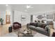 Cozy living room with modern decor, comfortable seating, and an open layout perfect for entertaining at 474 Maxwell Rd, Roswell, GA 30075