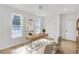 Bright office with a large desk, seating, and a ceiling fan at 474 Maxwell Rd, Roswell, GA 30075