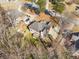 Aerial view of a home that features a back deck, green space and a stone chimney at 1290 Regency Center Sw Dr, Atlanta, GA 30331