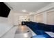 A finished basement with a TV, a large sectional, and recessed lighting at 1290 Regency Center Sw Dr, Atlanta, GA 30331