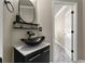 Modern bathroom features a vessel sink, elegant vanity, and stylish fixtures at 1290 Regency Center Sw Dr, Atlanta, GA 30331