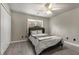 Bedroom with a ceiling fan, light colored walls and new floors at 1290 Regency Center Sw Dr, Atlanta, GA 30331