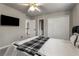 Bedroom with ceiling fan and entry to adjacent room at 1290 Regency Center Sw Dr, Atlanta, GA 30331