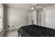 Bedroom with neutral paint, a ceiling fan and closet at 1290 Regency Center Sw Dr, Atlanta, GA 30331
