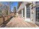 Spacious wooden deck offering outdoor living space, with access to windows and a door at 1290 Regency Center Sw Dr, Atlanta, GA 30331